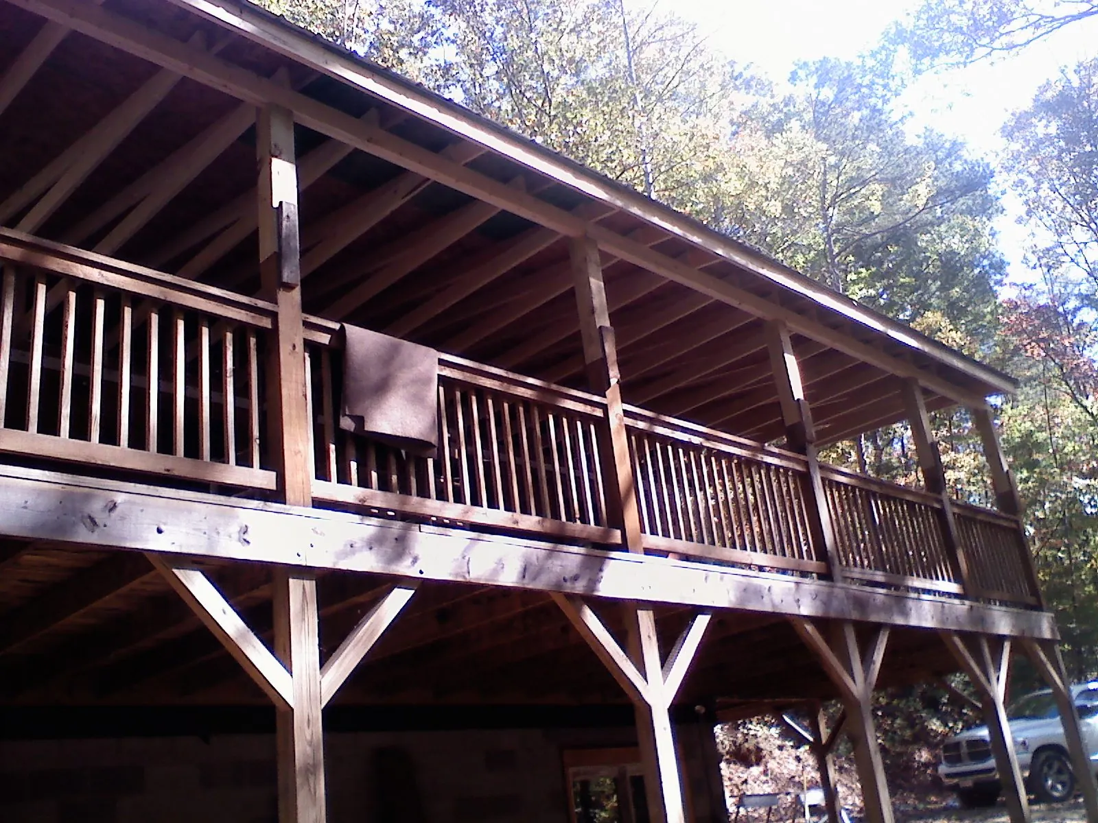 Timber framing under a new elevated porch and deck — Roof Leak Repair in Poteet by Roofing Brothers